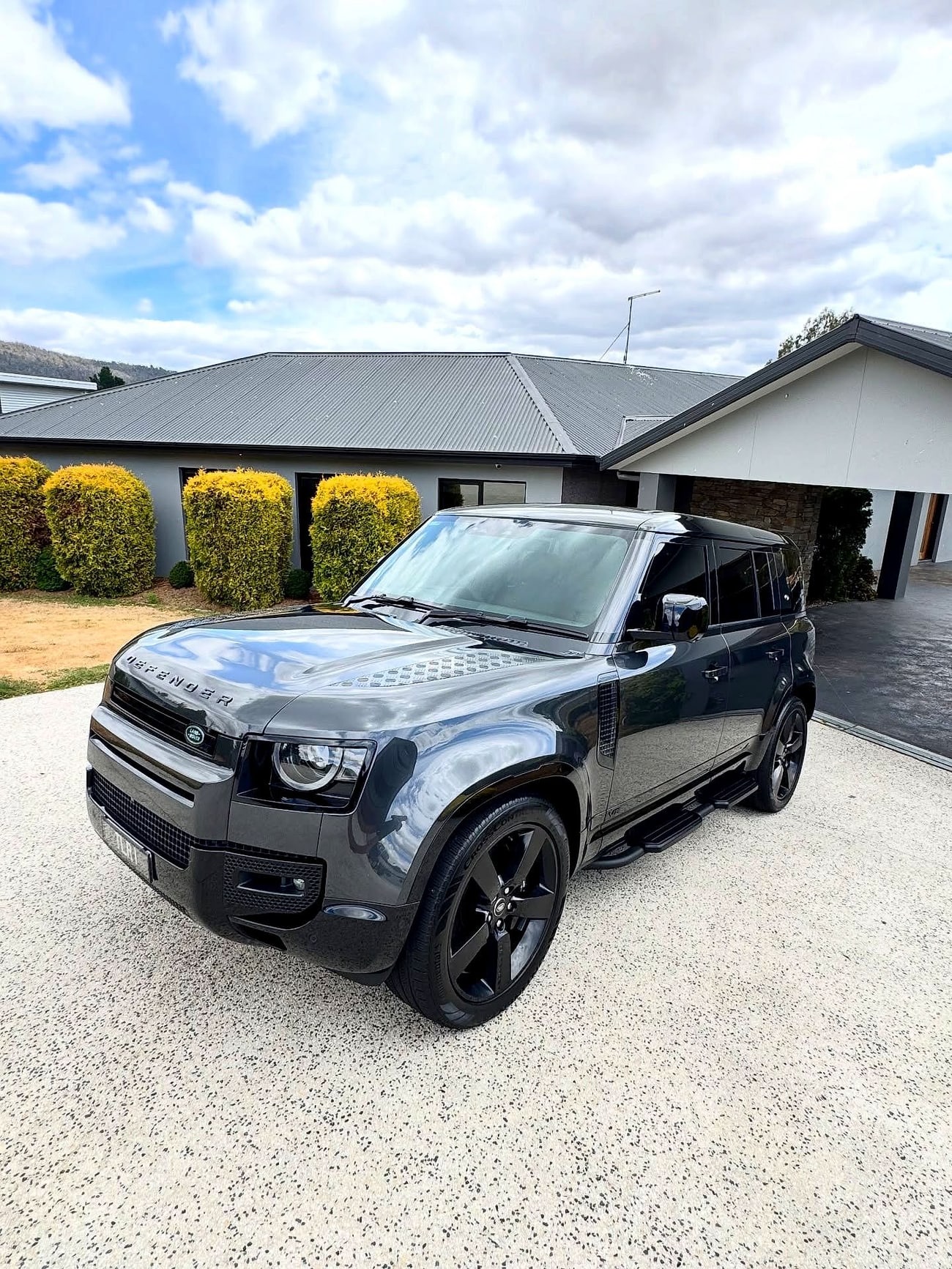 A Land Rover Defender detailed at home